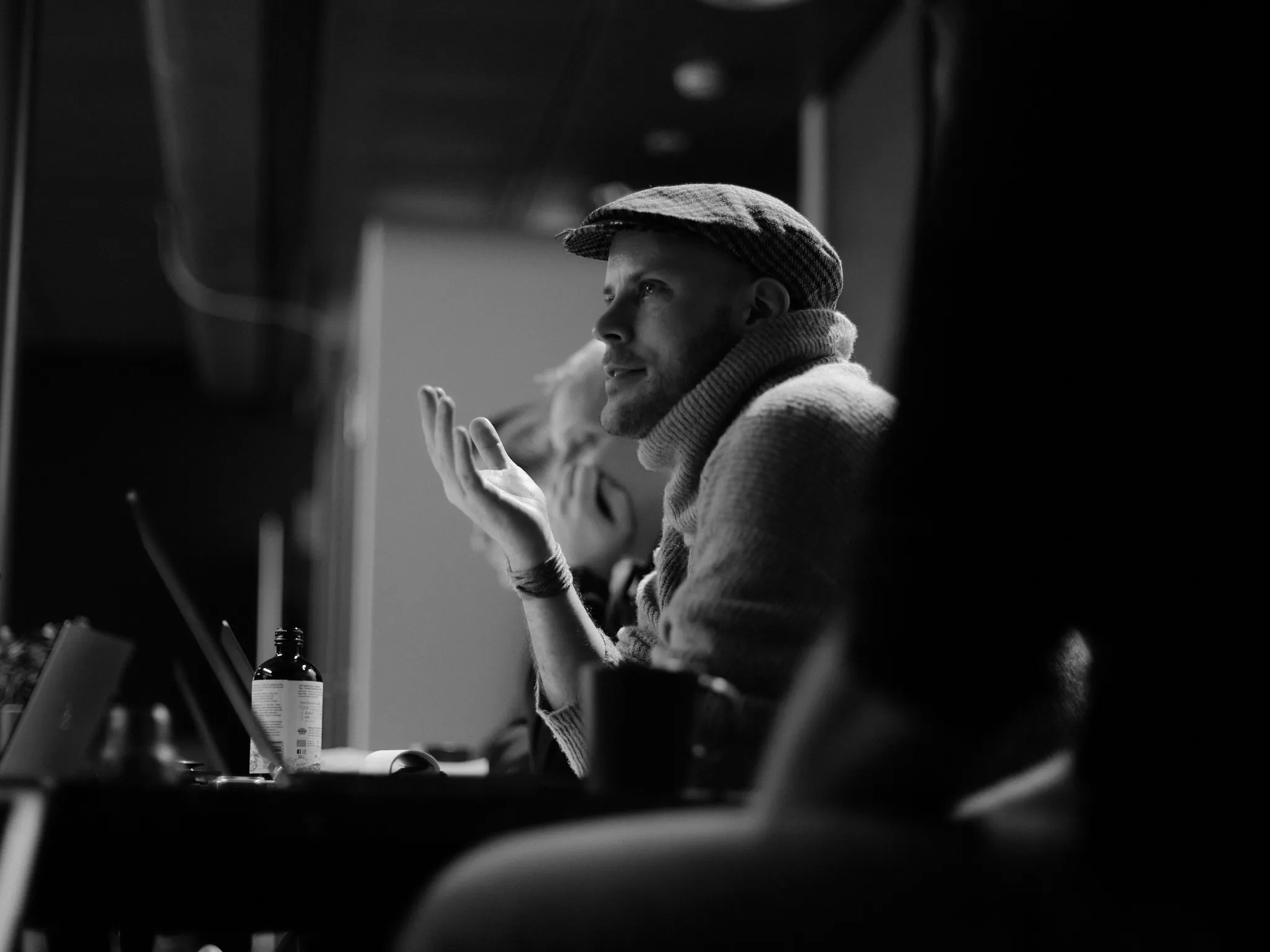 A Metaplay employee gestures during a team meeting